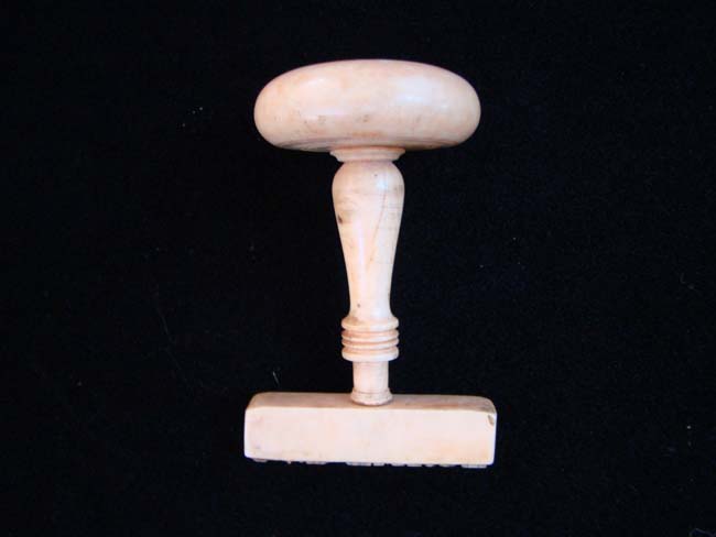 A RARE 19th century Whale Ivory document stamp with the name "N.Pearce" circa 1850